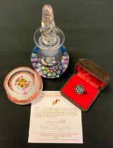 A Perthshire paperweights millefiori glass scent bottle paperweight, floral canes, multi-helix