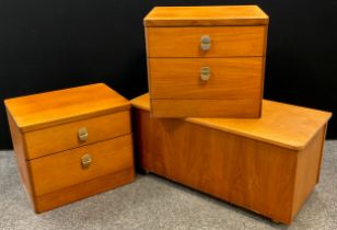 A pair of Stag furniture teak bedside chests, pair of graduated drawers to each, 48.5cm high x