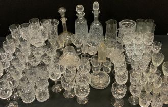 A quantity of cut glass Crystal including a set of five cut glass wine glasses, a pair of