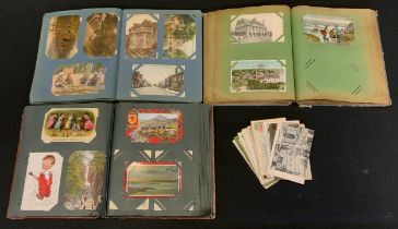 Postcards - three Edwardian and later postcard albums of humorous, topographical and other postcards