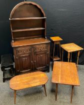 An oak arch top dresser, 185cm high x 97cm wide x 44cm deep; mid century oak coffee table; Edwardian