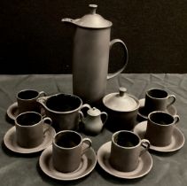 A Wedgwood black basalt coffee service for six comprised of; a coffee pot,27cm long, milk jug, sugar
