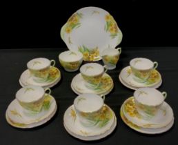 A Shelley ‘ Daffodil’ pattern no.13677, tea set for six comprised of; six Richmond shaped tea cups