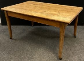 An Irish scrub top pine table, 76.5cm high x 147cm x 98.5cm.