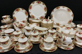 A Royal Albert ‘Old Country roses’ table service for twelve including; a tea pot, milk jug, sugar