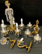 A six branch chandelier cast brass arms, diamond patterned glass piece, on central column and