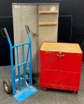 A metal lockable tool cabinet by ‘Stack-on’, drawers to top section, single open compartment to