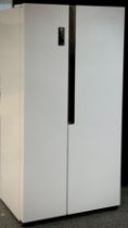 A Logik American style fridge freezer, model no. BCD-518wy/HC4(EAH2). 180cm high x 90cm wide x