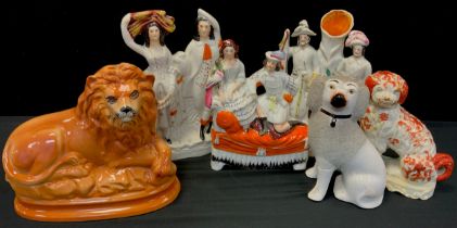 A group of three Staffordshire flat backs of courting couples and other; singular Staffordshire