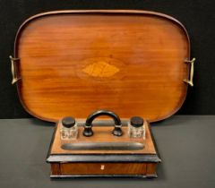A Edwardian shell lozenge twin handled tea tray, 54cm long; Victorian Standish, ebonised handle,