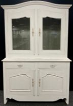 A French style ‘Buffet deux corps’, serpentine shaped top, pair of glazed doors, above a base with