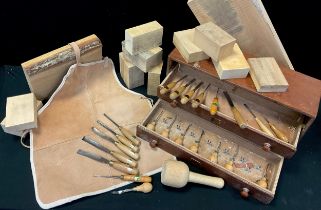 A set of wood-carving tools, including Ashley Iles Blockcutters / palm chisels - curved gouge (