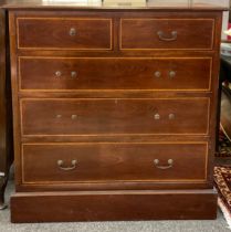 An Edwardian mahogany chest of two short over three long graduated drawers, 108.5cm high, 106.5cm