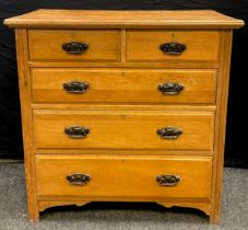 An oak chest of drawers, two short over three graduated long drawers, art nouveau handles, 101.5cm