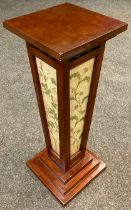 A 19th century mahogany torchere/jardinere stand, square tapering column inset with needlework