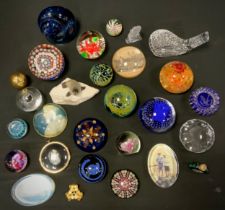 A collection of glass paperweights including Medina, Waterford crystal, Caithness and millefiori;