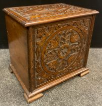 A late Victorian carved oak log box, 50cm high x 53cm wide x 37.5cm, c.1900.