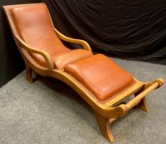 A Walter Knoll style walnut chaise longue, tan leather upholstery, 89cm high x 191cm long x 63cm