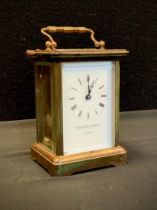 A 20th century Matthew Norman Carriage clock/time piece, cream dial, Roman numerals, four glass