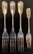 A set of three George IV silver Hanoverian pattern table forks, each with four tines, probably