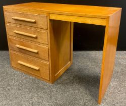 An oak desk, four graduated drawers, 76cm high x 112cm wide x 47cm deep.