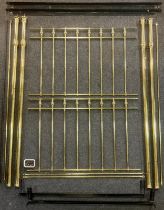 A Brass King size four-post bed frame, 221cm high.