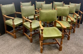 A set of ten oak and green leather upholstered boardroom chairs, each measuring 96.5cm high x 57.5cm