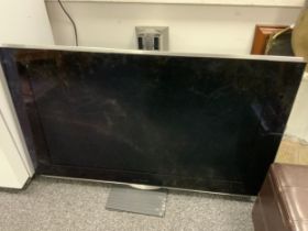 A Bang & Olufsen Beovision 7-40 motorized Tv and stand, type 9351, serial number 19166219, 40inch