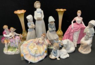 A group of figures including Nao girl with pup,22cm high, woman with geese, 20cm high, three others;