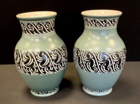 A pair of Pearson of Chesterfield baluster vases, two tone blue, incised sgraffito decoration,