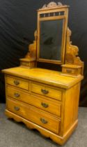 A late Victorian scumbled pine dressing chest, 176cm high x 107cm wide x 48cm deep, c.1890.