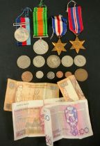 A WWII four piece Medal group, France & Germany Star, 39-45 Star , Defence medal etc in unnamed case