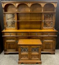 An Old Charm oak dresser, 184cm high x 187.5cm wide x 45cm deep; an Old Charm side cabinet, (2).