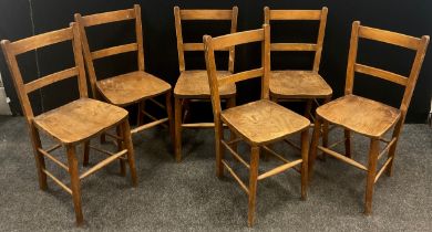 A set of six early 20th century elm and beech chapel chairs, each measuring approx. 85cm high x 35cm