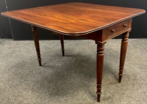 A 19th century mahogany Pembroke table, drawer to each end, turned legs, 74.5cm high x 108cm x