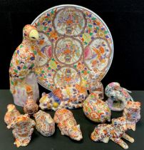 A group of modern Chinese imari style animals including a parrot,40cm high, cats, frogs, birds; a