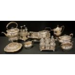 A Victorian four piece silver plate tea set, Christopher Dresser style cruet set, another cruet set,