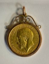 A George V sovereign pendant, 1918, Perth mint, 9ct gold mount, 10g gross