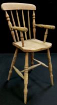 A 19th century child’s Elm Windsor high chair, spindle-back, H-stretcher, 88cm high x 42cm wide x