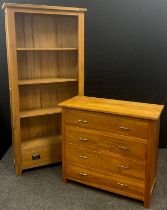 An oak tall open bookcase, four tiers of shelving, above a pair of short drawers, 189.5cm high x