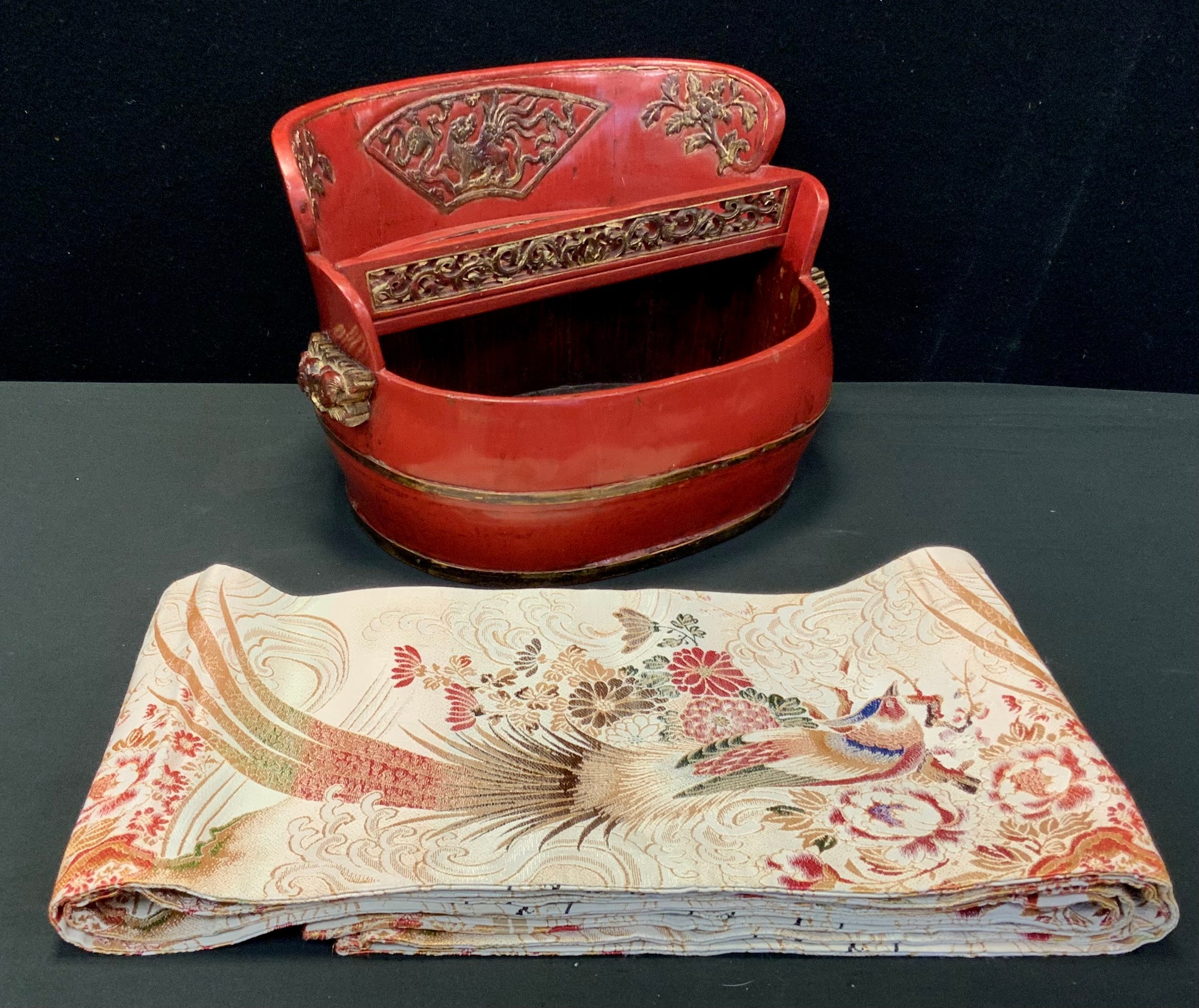 A Japanese lacquered oval rice bucket, ornate galleried top tier with pierced shelf and frieze,