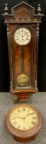 A 19th century walnut cased Vienna wall clock, brass and white enamelled dial, Roman numerals,