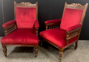 A pair of Victorian Aesthetic Movement drawing room armchairs, 107cm high x 71cm wide x 74cm deep,