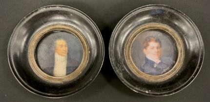 A pair of reproduction portrait miniatures, circular ebonised wooden frames, 15cm dia overall (2)