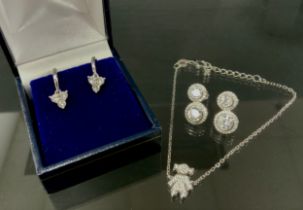 A pair of double cluster ring halo Cubic Zirconia earrings, another pair hoops with triangular