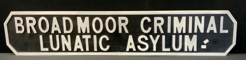 A wooden replica sign of 'Broadmoor criminal Lunatic Asylum', 121cm long