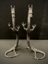 Pair of bronzed metal standing dragons, 40cm high (2)