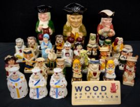 A collection of Tony Wood studio pottery mini figures including different Alice in Wonderland