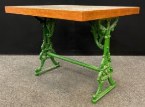 A marble-top table, Coalbrookdale style cast iron base, painted green, 75cm high x 93.5cm x 78.5cm.