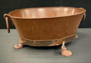 An oval metal iron ring handled oval bath tub planter, 50cm long